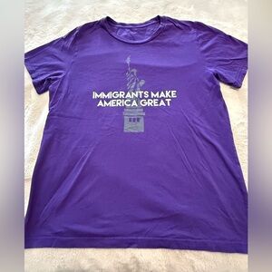 Purple Graphic T-Shirt With White Lettering.  Size Large.